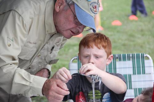 Learning to tie a fly at the Skagit River Salmon Festival.